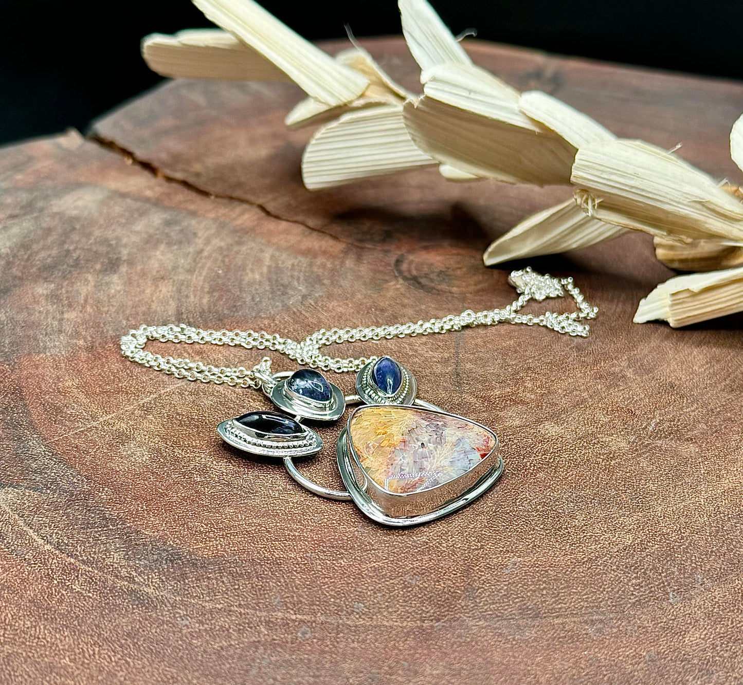 Sterling Silver Fossilized Coral and Iolite Pendant